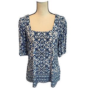CeCe Navy and White Floral Blouse with puff sleeve.